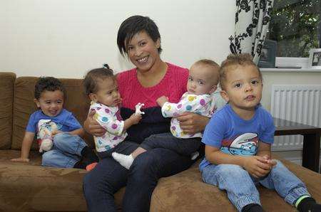 Stacy Wright with her two sets of twins, from left, Harry, Annie, Eliza and Oscar