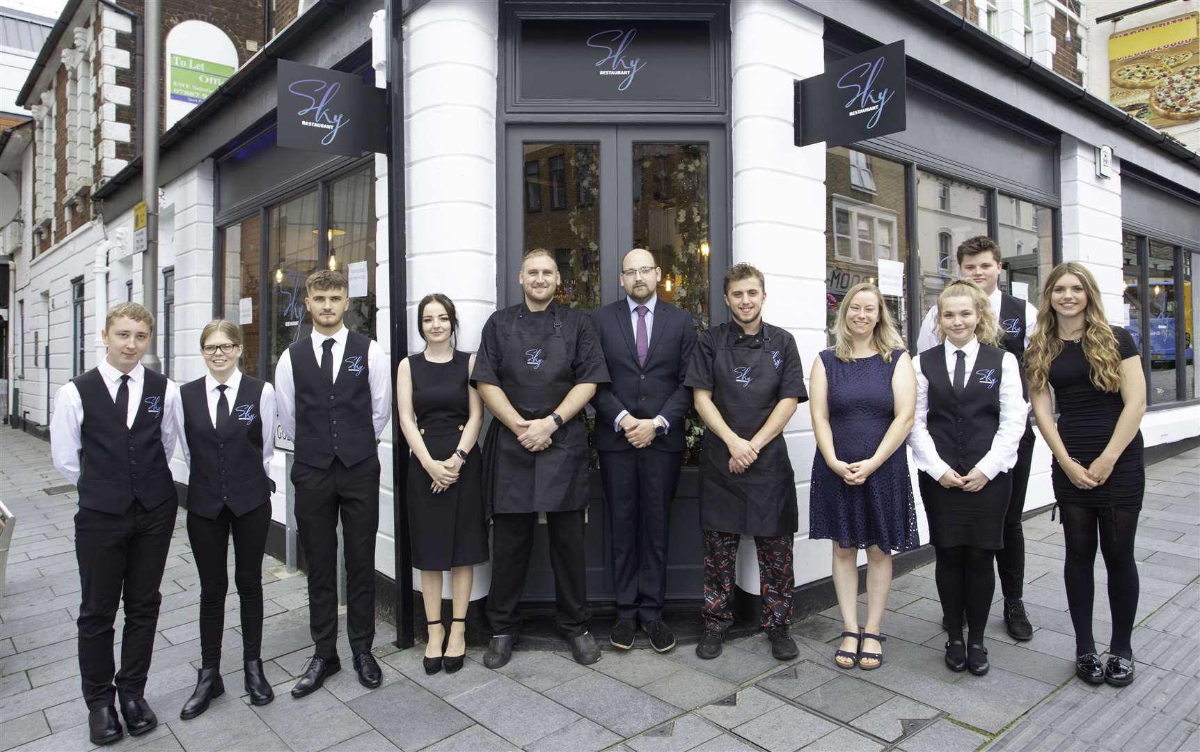 Head chef Sam Pendry, centre left, and manager Dan Walbridge, centre right, with the Sky team