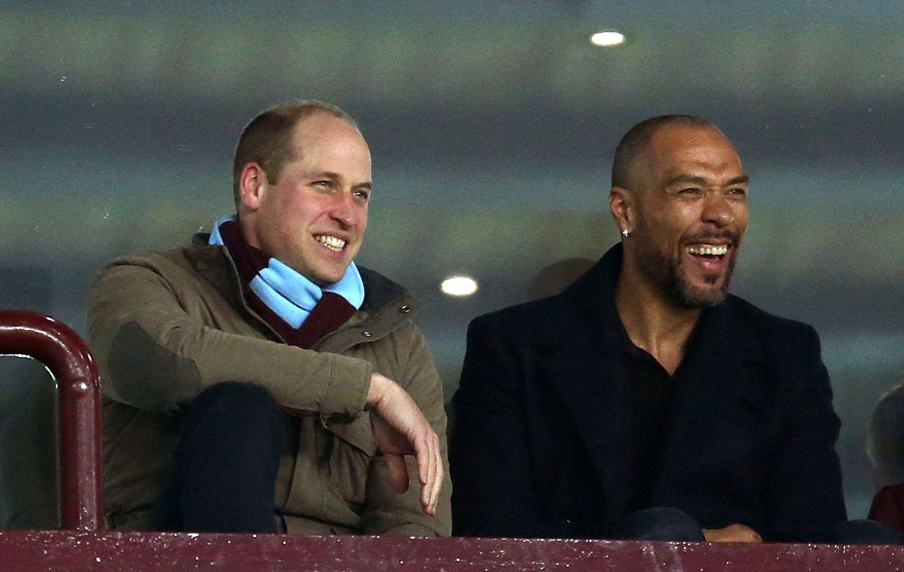 William watching Aston Villa with one of the club’s former players John Carew. Paul Harding/PA Wire