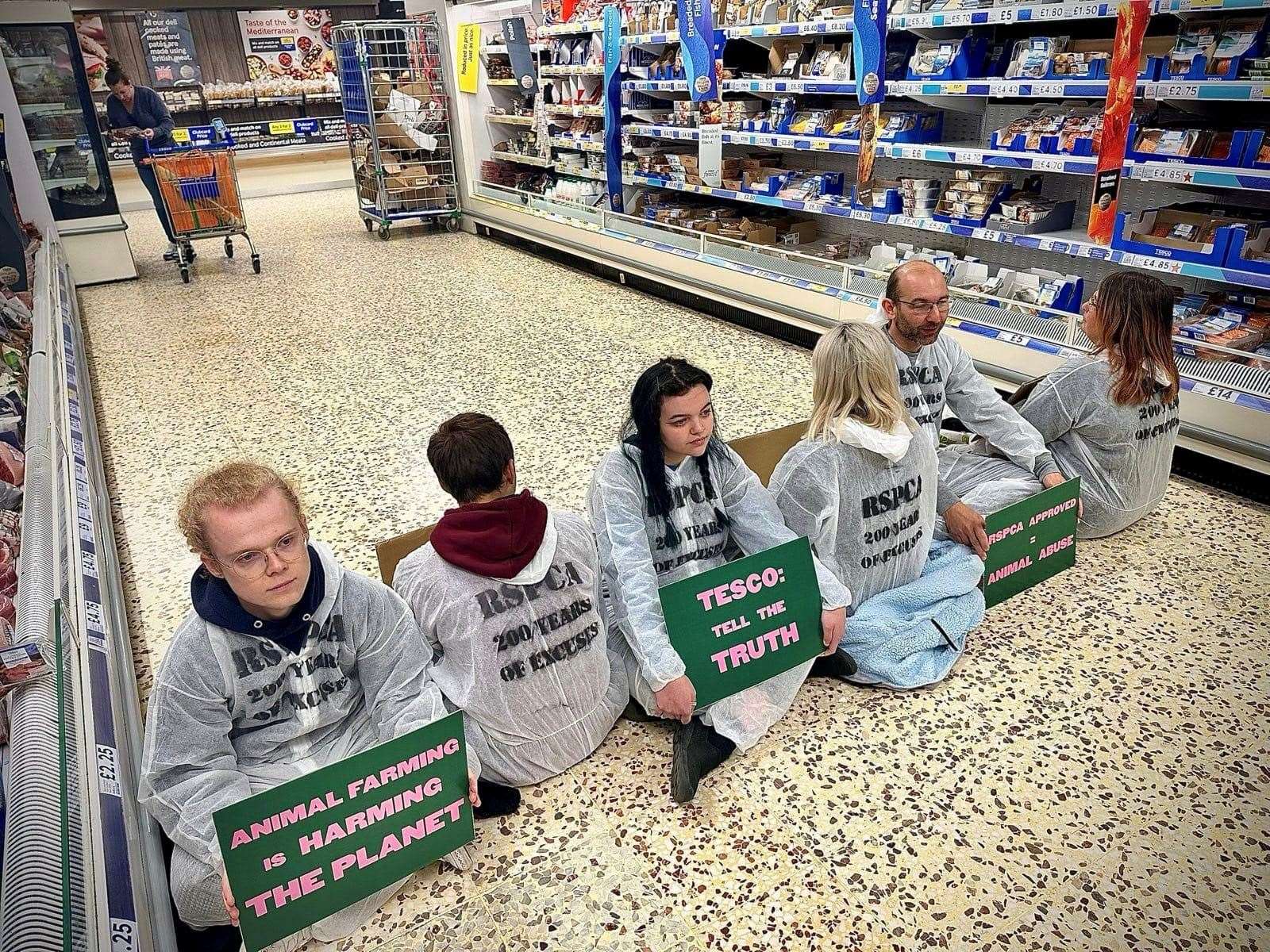 Six people from Animal Rising - a group campaigning for a transition to a plant-based food system - protested in the meat aisle at Crooksfoot Tesco in Willesborough, Ashford. Picture: Animal Rising