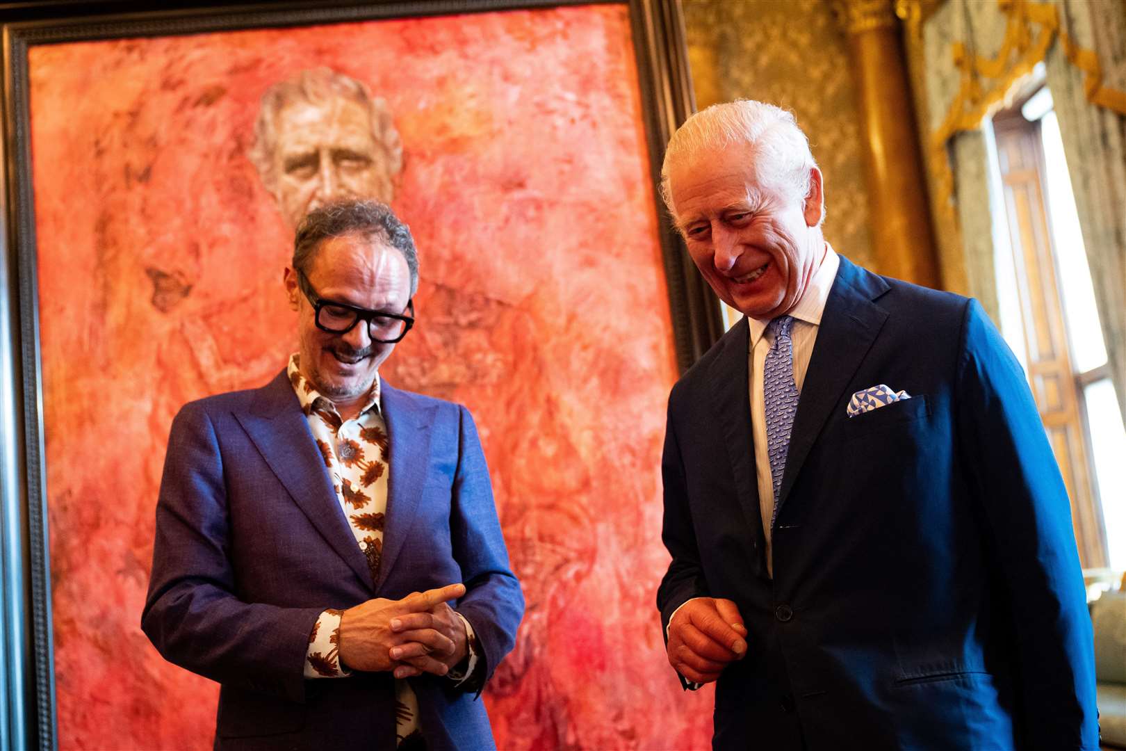 Artist Jonathan Yeo and the King during the unveiling (Aaron Chown/PA)