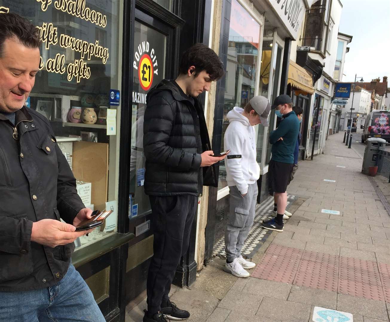 The queue outside The Barber Chop, Whitstable