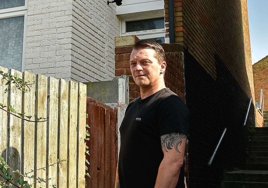 Caption: Slug: GM FIRERESCUE 130819Caption: Neal Read, neighbour, at the rear of 14 Rose Street, Northfleet, Kent, DA11 9EQ where he assisted the elderly occupant of the house to escape from the fire through the rear first floor window onto the extention roof and to safetly Location: NORTHFLEETCategory: FIREPicture: Tony Jones (15186525)