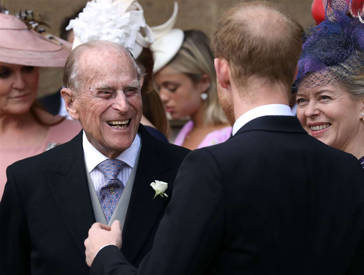 The Duke of Edinburgh talks to the Duke of Sussex after the wedding of Lady Gabriella Windsor and Thomas Kingston at St George’s Chapel in Windsor Castle in May 2019 (Steve Parsons/PA)