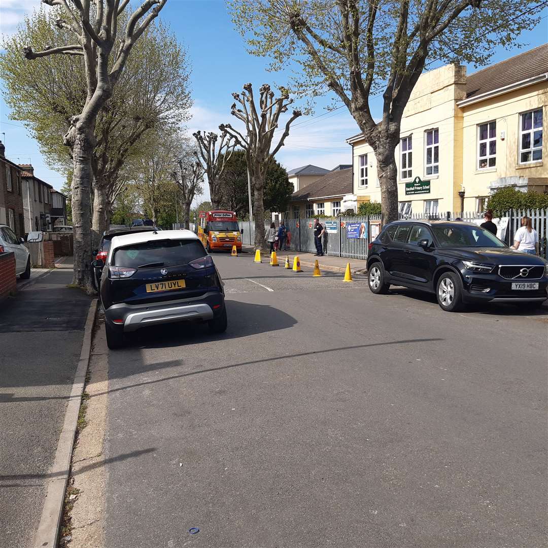 An area has been coned off to improve children's safety outside the school gates, the Trust said. Photo: Sean Delaney