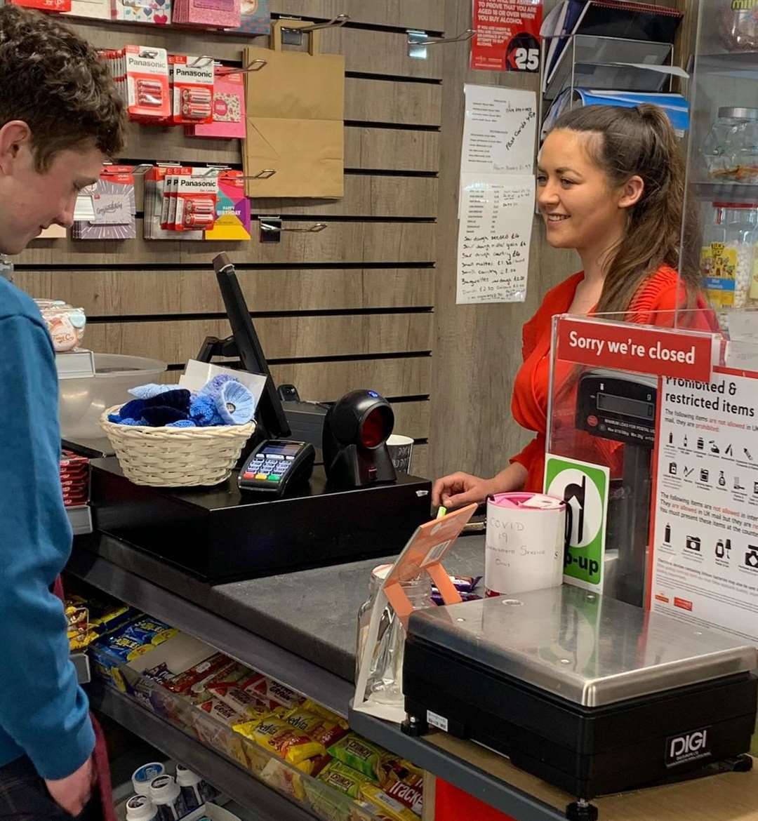 Detling Commuity Store: shop manager Lou Reed serving a customer