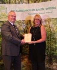 Kent Natural Burials manager, Sian Muir, receiving the ‘Best Burial Ground of the Year’ award in Biringham