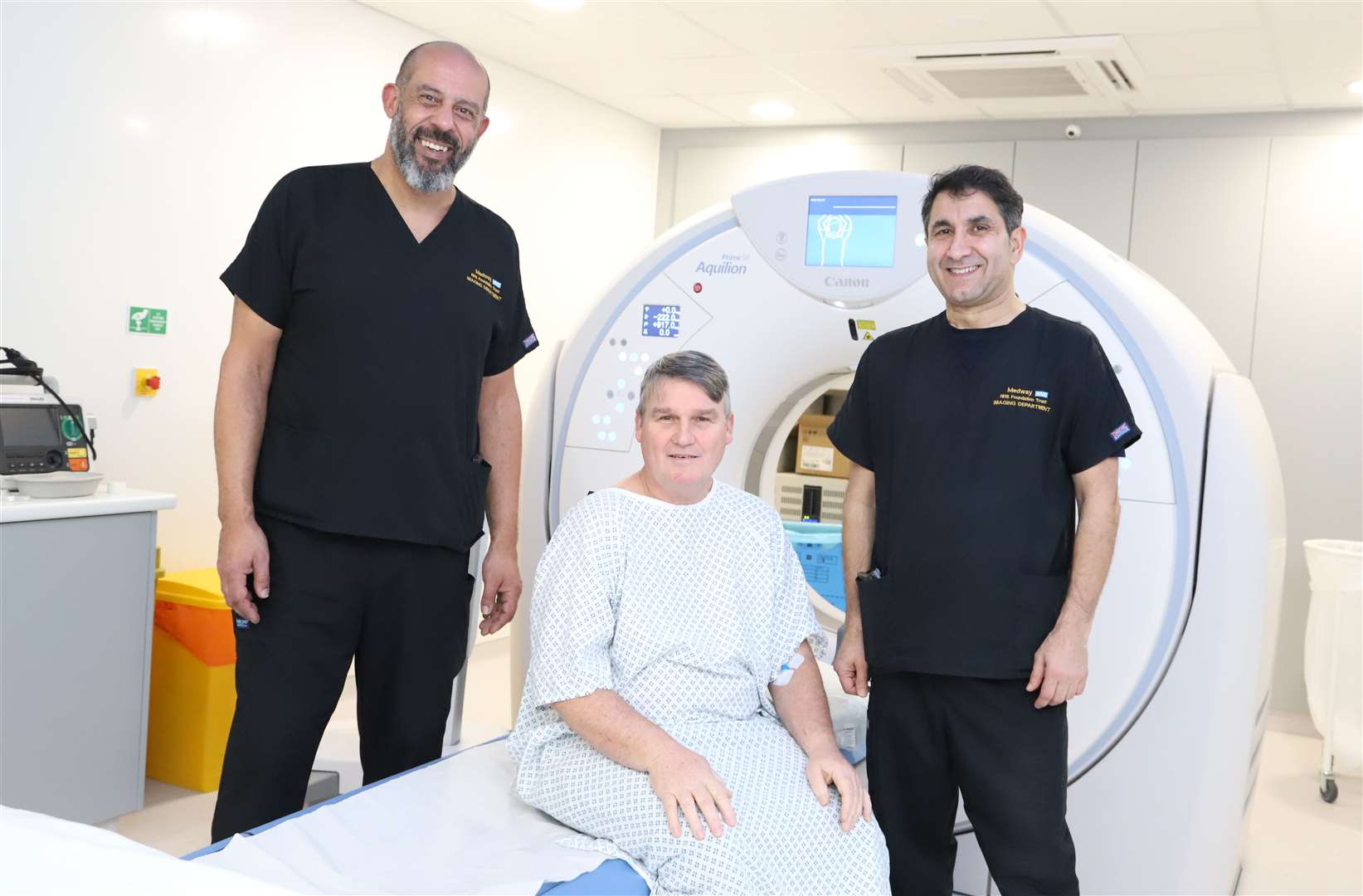 Radiographers Jay and Sohail pictured with patient Paul. Picture: NHS