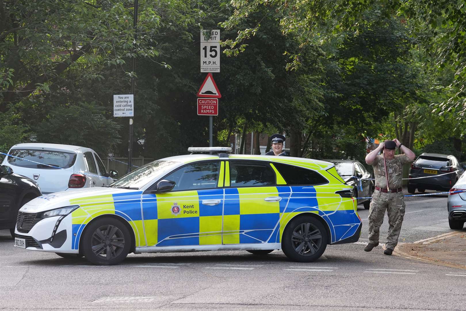 Officers at the scene in Sally Port Gardens in Gillingham (Gareth Fuller/PA)