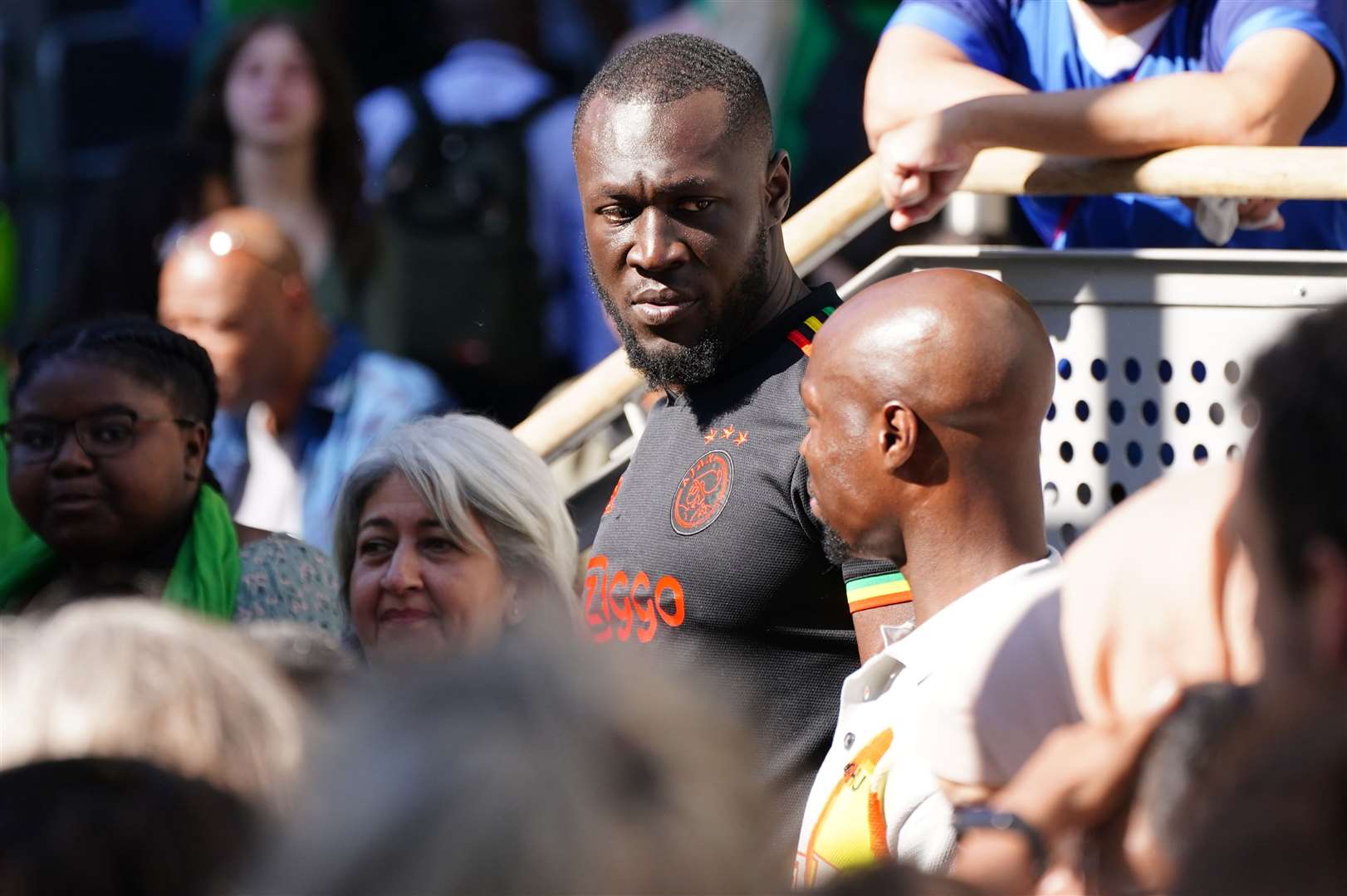 Stormzy joined others watching the service which was live-streamed on screens in the surrounding area (Dominic Lipinski/PA)