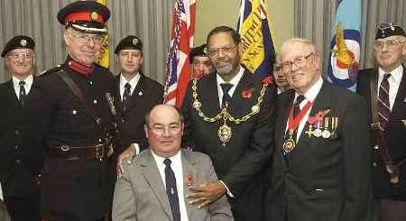 Chairman of the Kent County Royal British Legion, Tom Styles, centre, with KCC chairman Frank Gibson, right