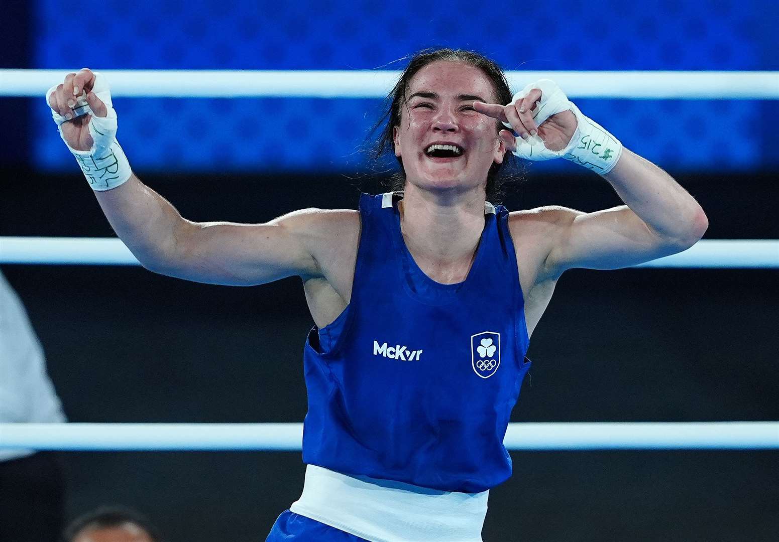 Kellie Harrington celebrates victory over China’s Wenlu Yang (Peter Byrne/PA)