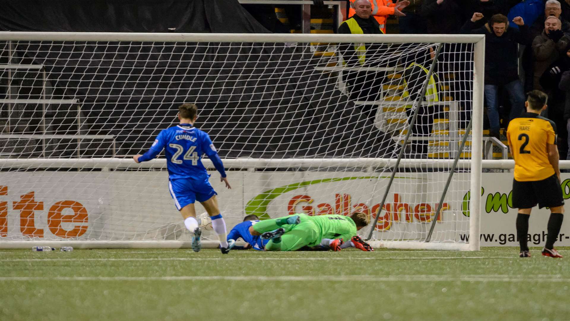 Trialist Rhys Murphy (grounded) heads Gills level Picture: Andy Payton