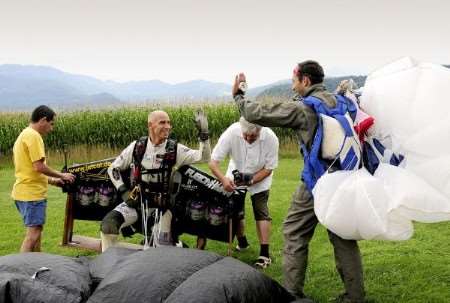 Frenchman Yves Rossy celebrating a successful landing. Picture: Alain Sauquet/ Cirrus/National Geographic Channel