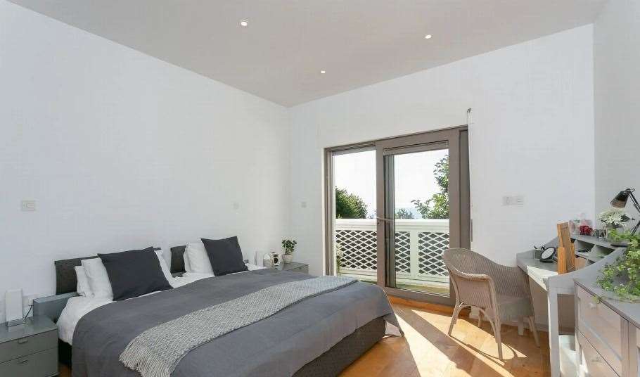 The house has four bedrooms, including a master bedroom with a balcony and en suite. Picture: Lawrence and Co