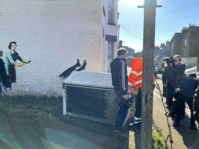 The chest freezer being removed from the Banksy artwork in Margate. Picture: Dan Bambridge-Higgins