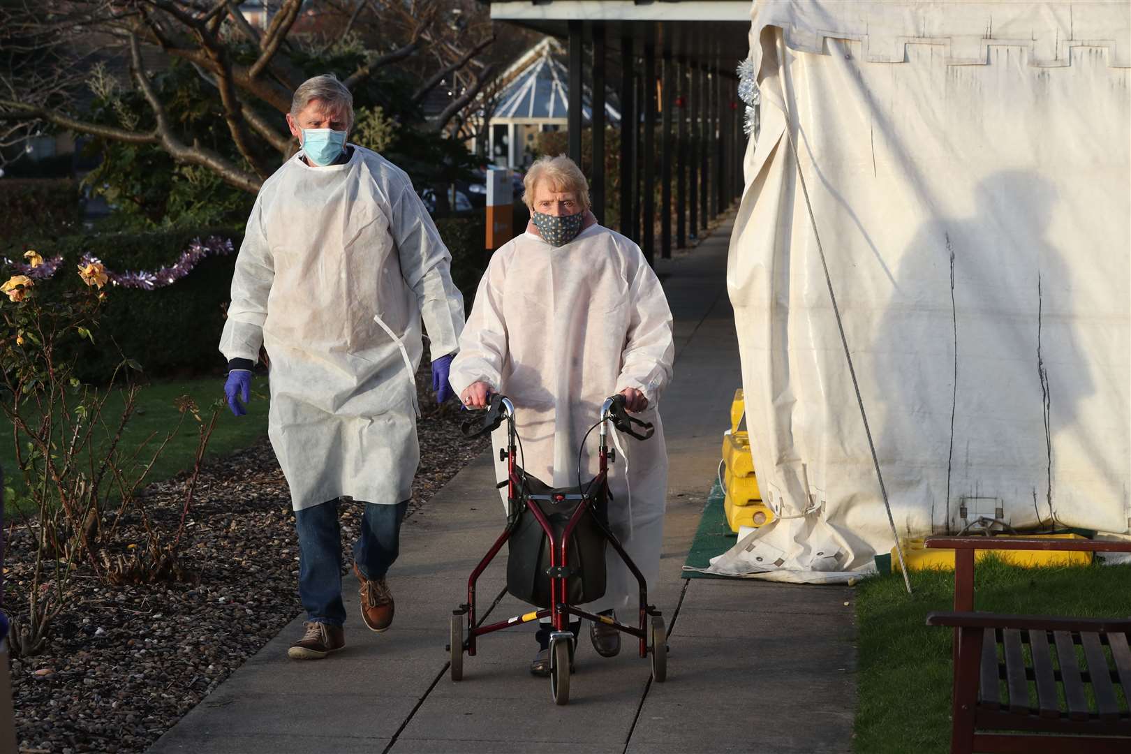 Andrew Will and his mother Jean Glenndenning were also dressed in PPE for their visit with her husband Jeff at Aspen Hill where coronavirus tests were carried out before families were allowed to meet (Danny Lawson/PA)