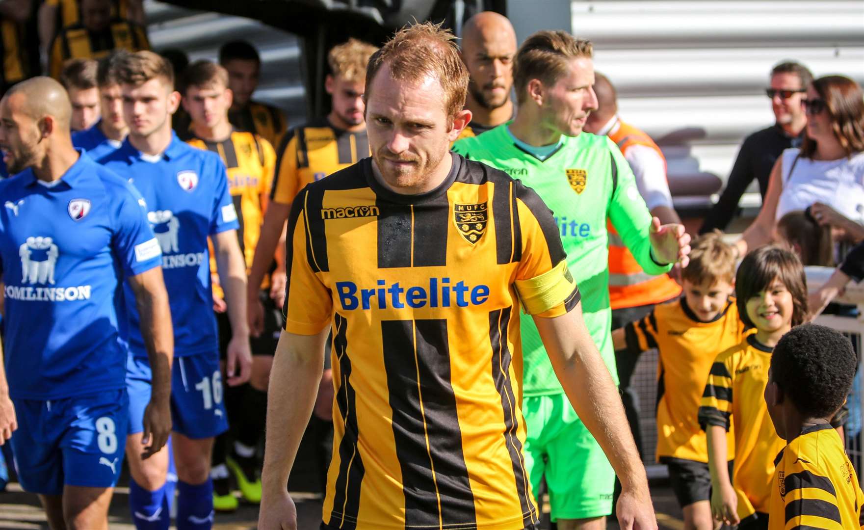 Skipper Stuart Lewis leads Stones out Picture: Matthew Walker