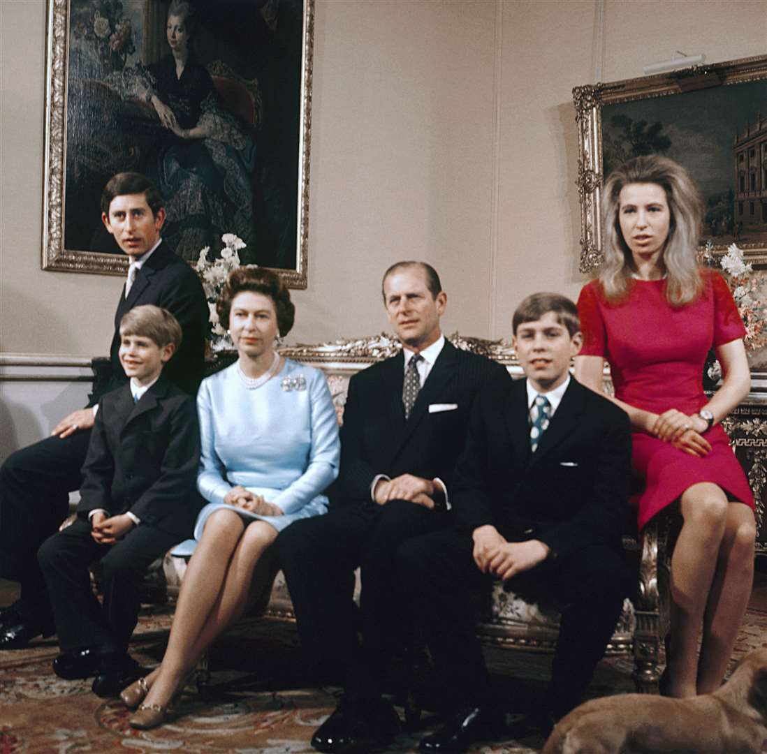 A young Princess Anne with the royal family (PA)