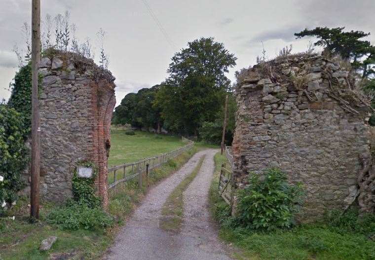 The entrance to the Boxley Abbey estate through a ruined archway