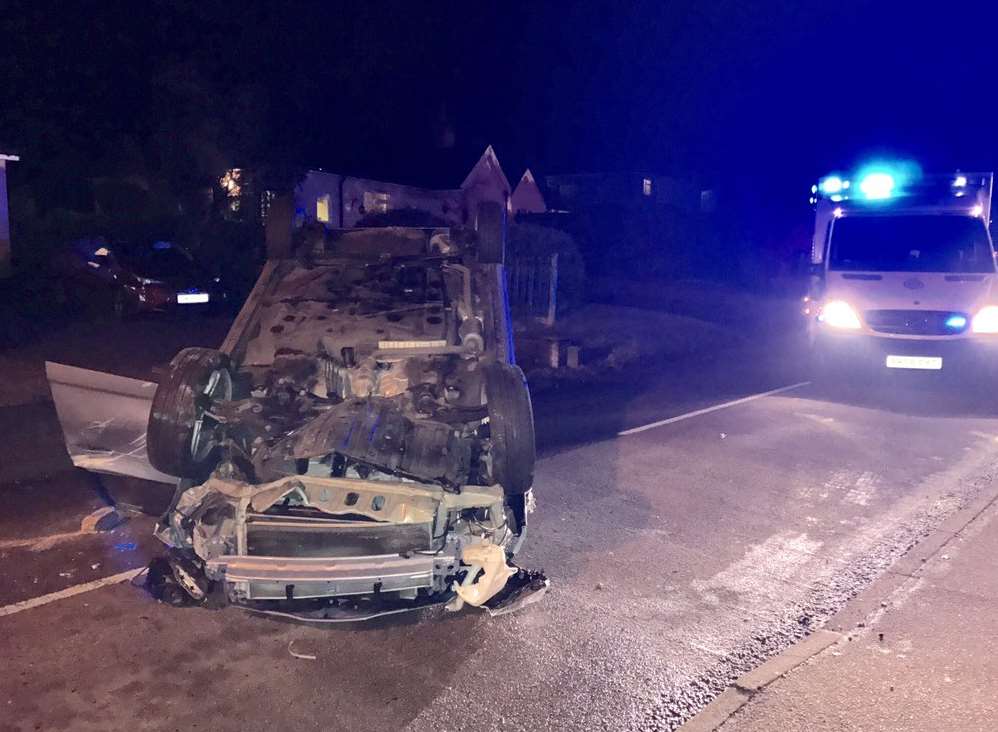 The car rolled onto its roof Photo: Bobby Bewy