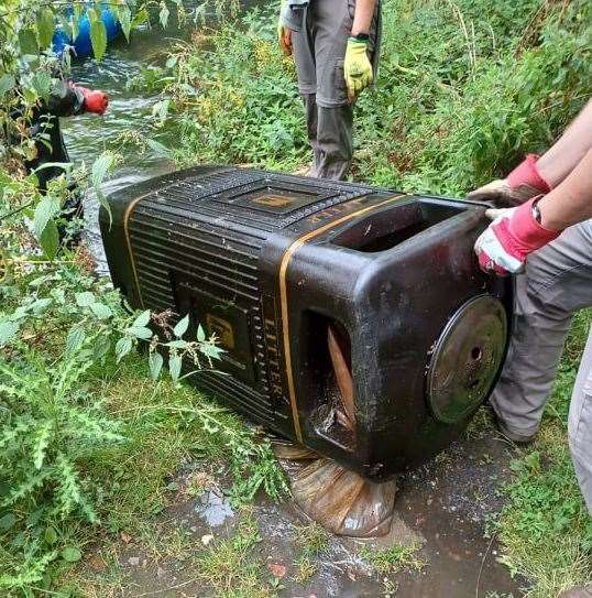 A litter bin pulled from the river