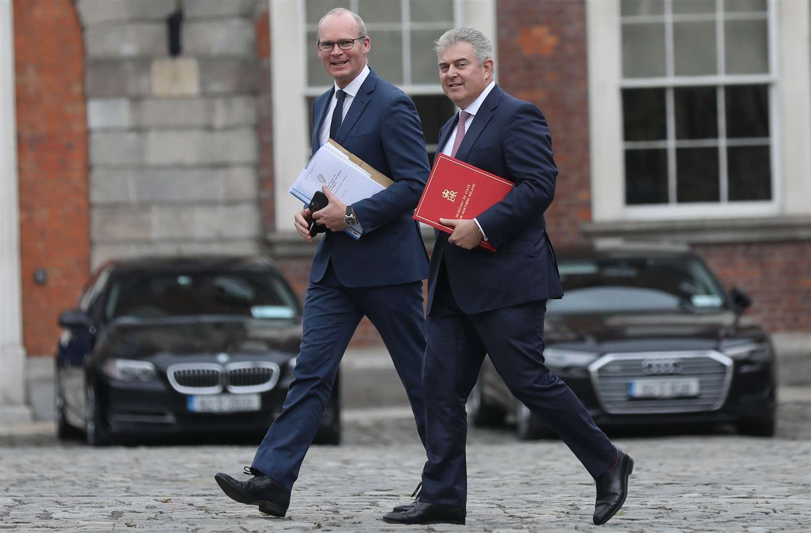 Simon Coveney and Brandon Lewis (Julien Behal Photography/PA)