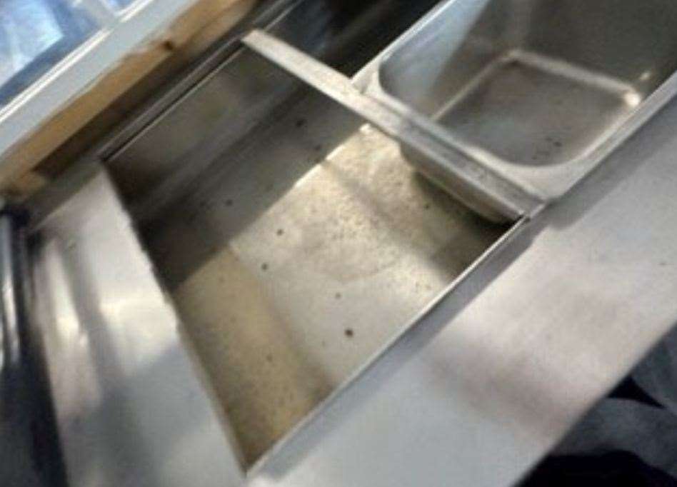 The bain-marie contained dirty water with insects in