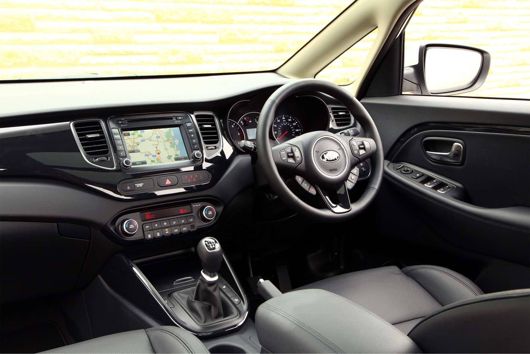 Interior of a Kia Carens.