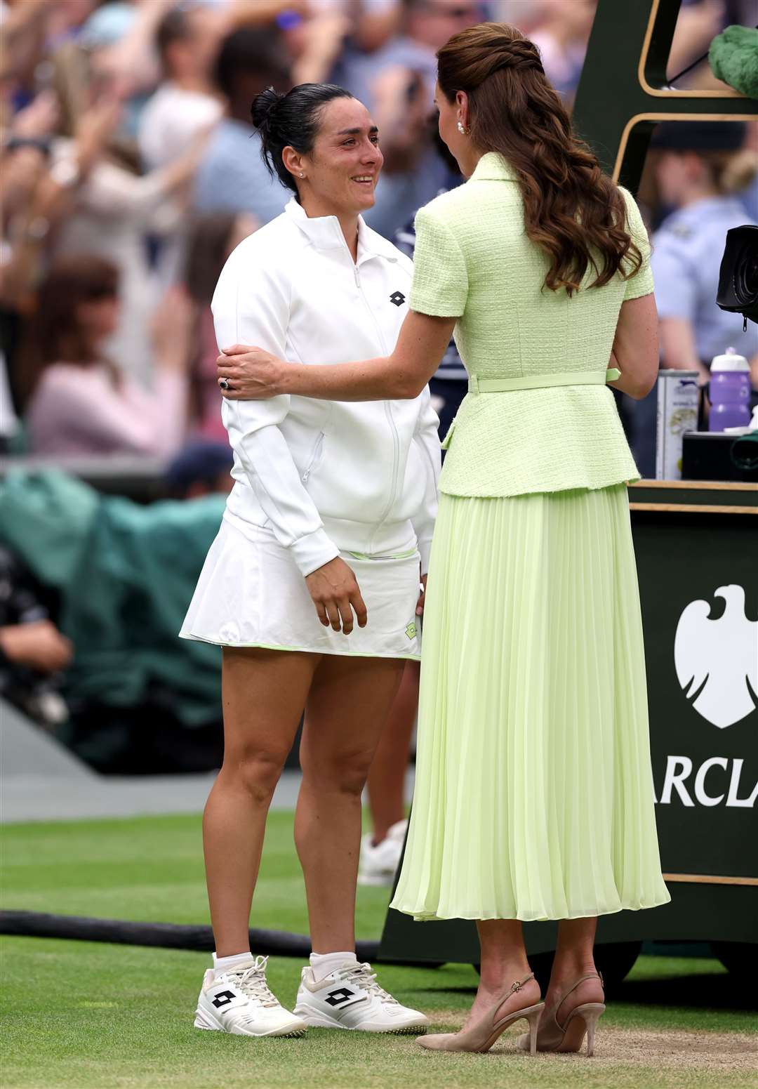 Kate consoling Ons Jabeur on court after her defeat (Steven Paston/PA)