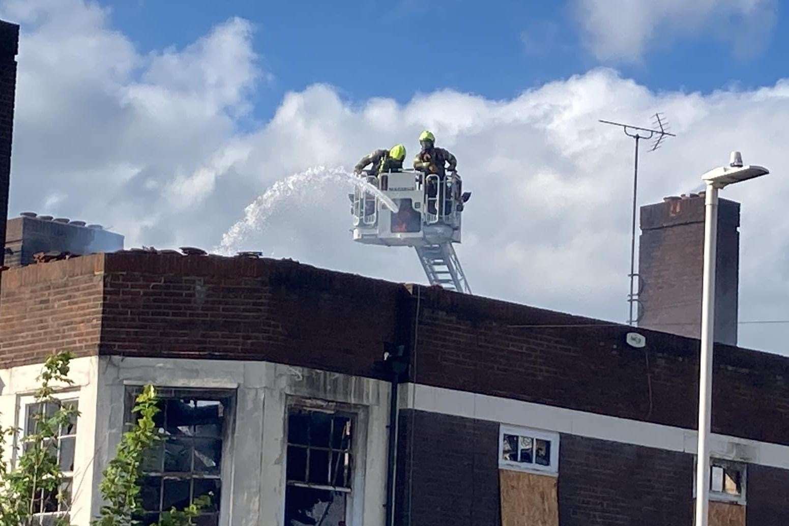 Firefighters put out a fire at the former Nore pub in St George's Avenue, Sheerness. Photo: John Nurden
