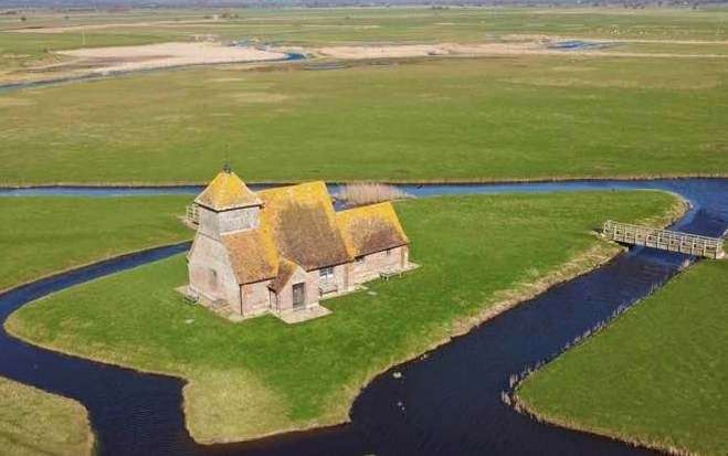 St Thomas Becket Church in Romney Marsh can only be accessed by crossing a bridge. Picture: Steven Rees