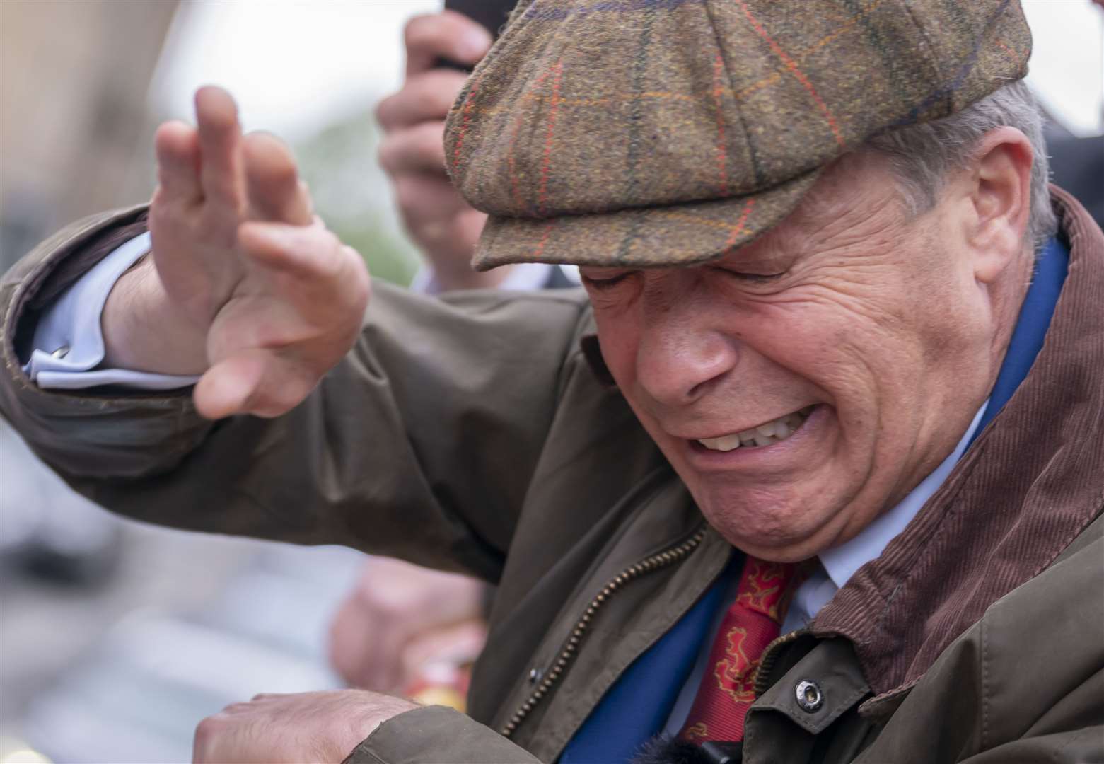 Nigel Farage reacts after something is thrown towards him on the Reform UK campaign bus in Barnsley, South Yorkshire, on June 11 (Danny Lawson/PA)