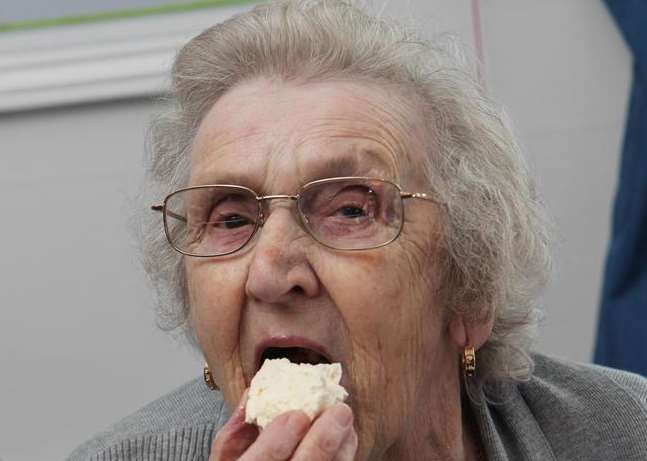 Joan Playford enjoying the cream tea