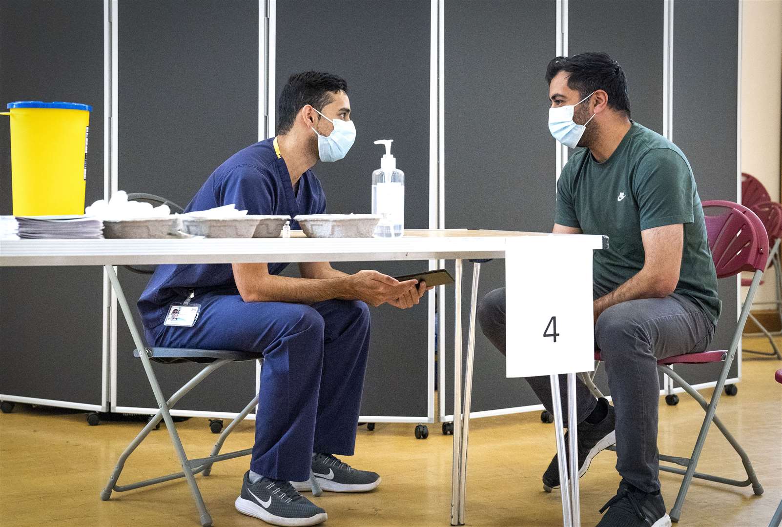 Humza Yousaf receives his vaccination at the Glasgow Central Mosque (Jane Barlow/PA)