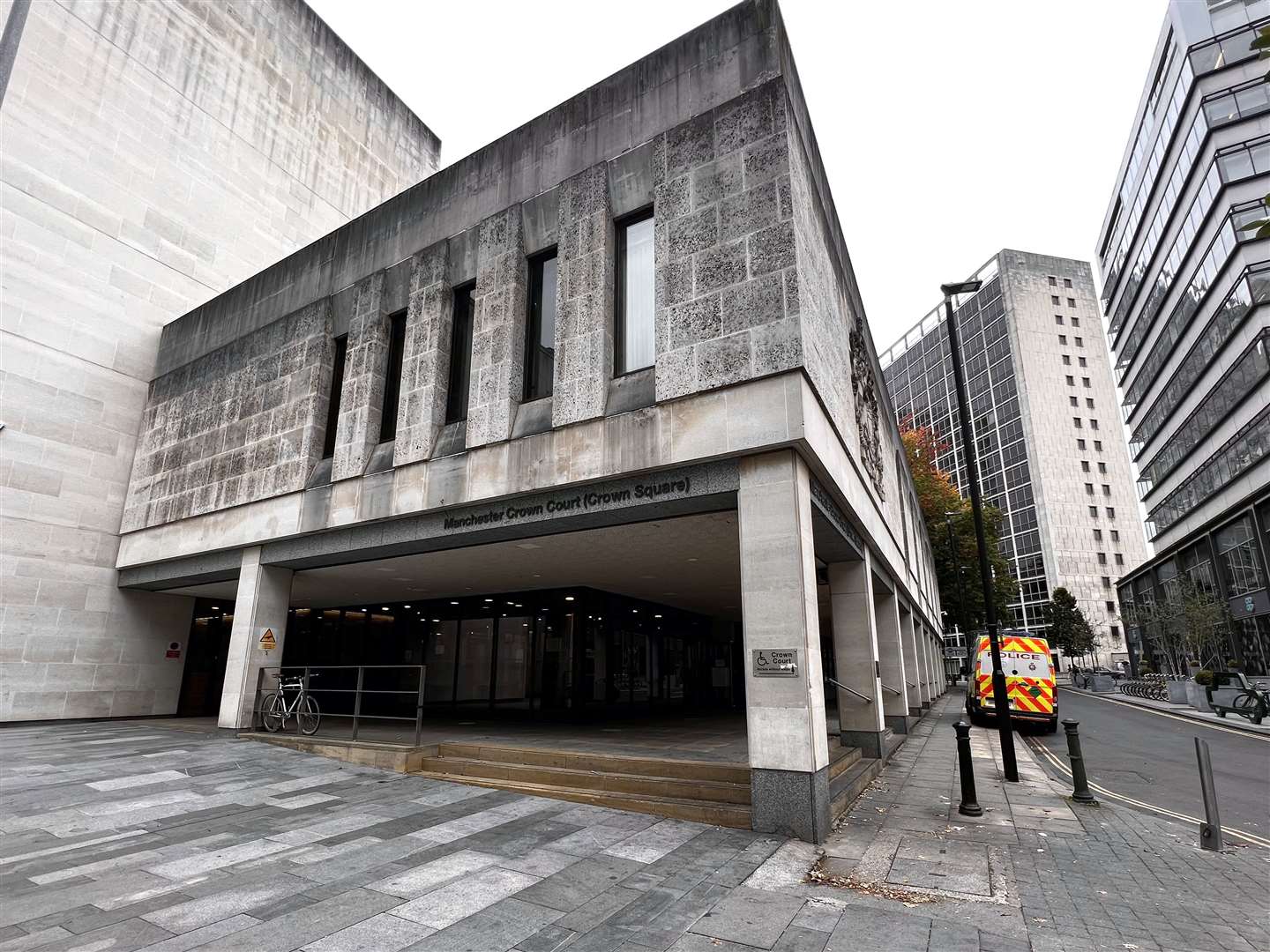 A police van parked outside Manchester Crown Court (Steve Allen/PA)