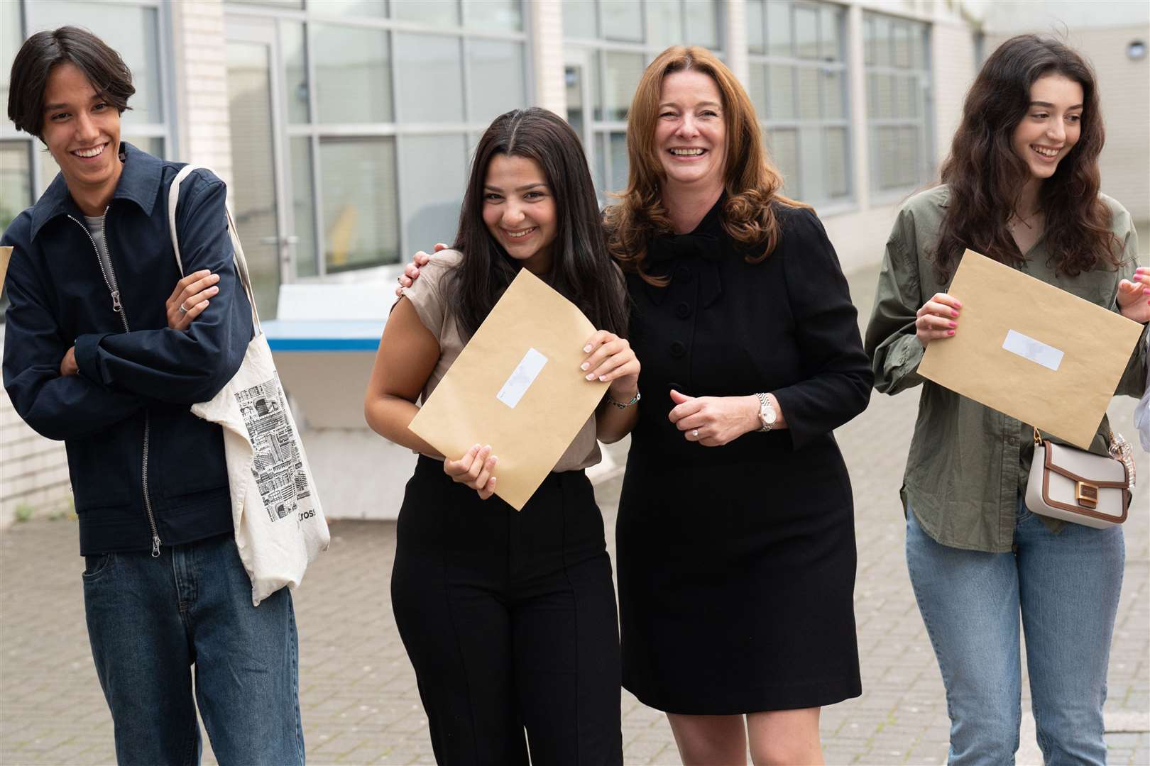 Education Secretary Gillian Keegan celebrated with pupils at City of London Academy in Islington (Stefan Rousseau/PA)