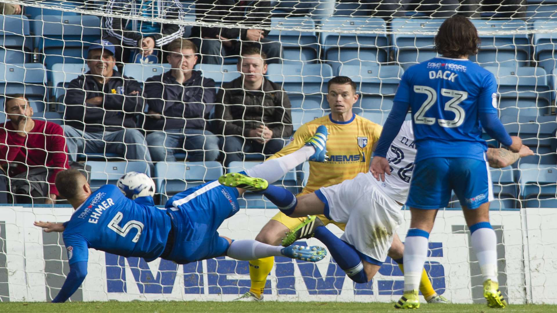 Max Ehmer takes action as Peter Clarke lurks dangerously Picture: Andy Payton