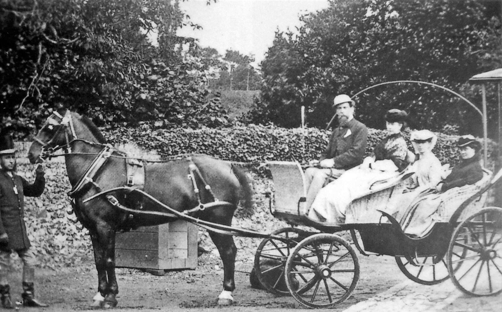Charles Dickens and his family in a carriage at their home in Higham. At the horse’s head is groom John Marsh, who foiled an attempt to cause "serious mischief" to the vehicle