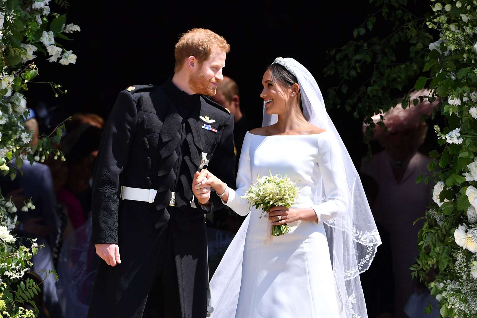 Harry and Meghan leaving at St George’s Chapel on their wedding day (Ben Stansall/PA)