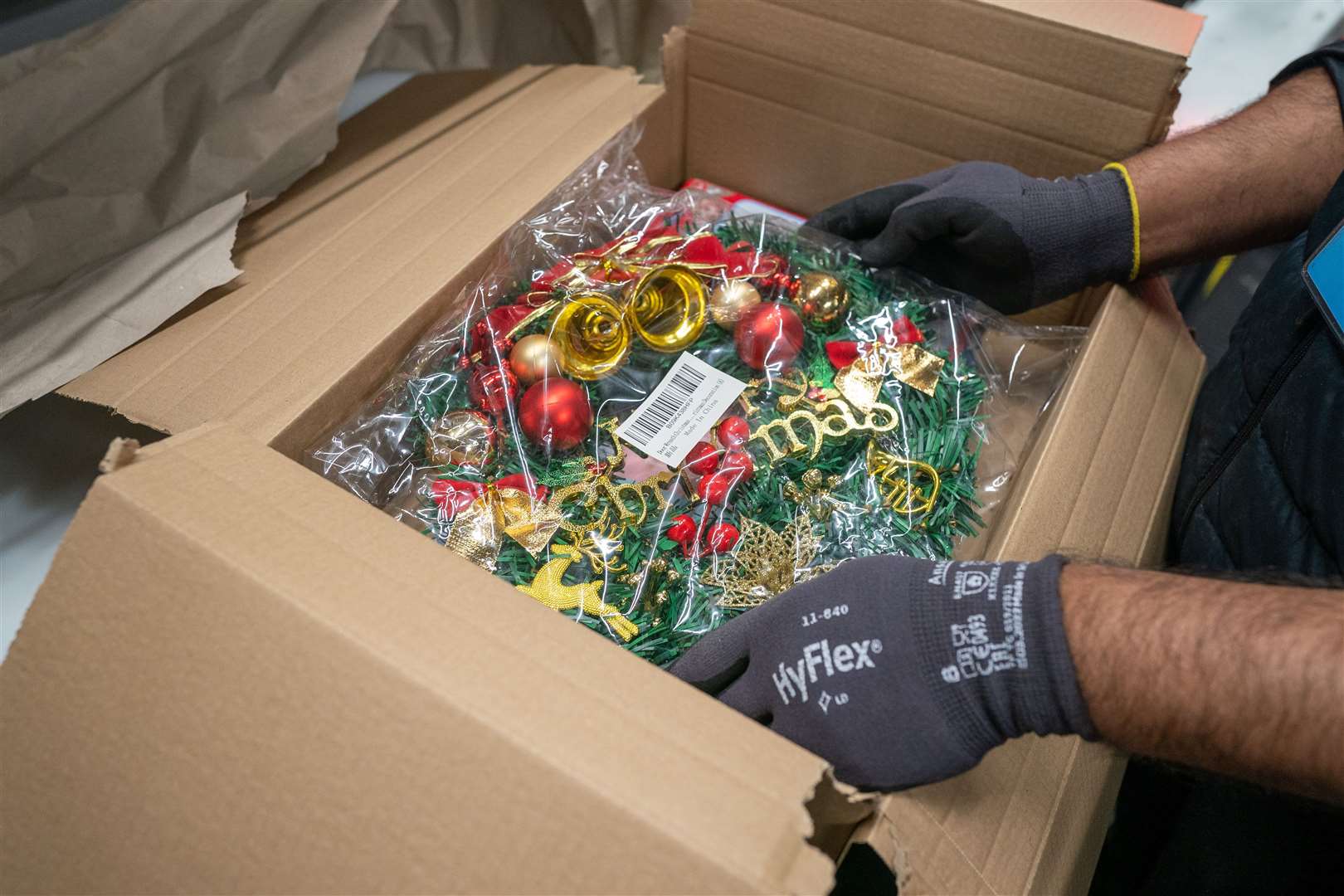 Christmas decorations are prepared for shipping (Ben Birchall/PA)