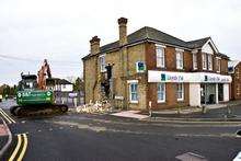 The remains of a bank's wall after a cashpoint stolen in Loose, Maidstone