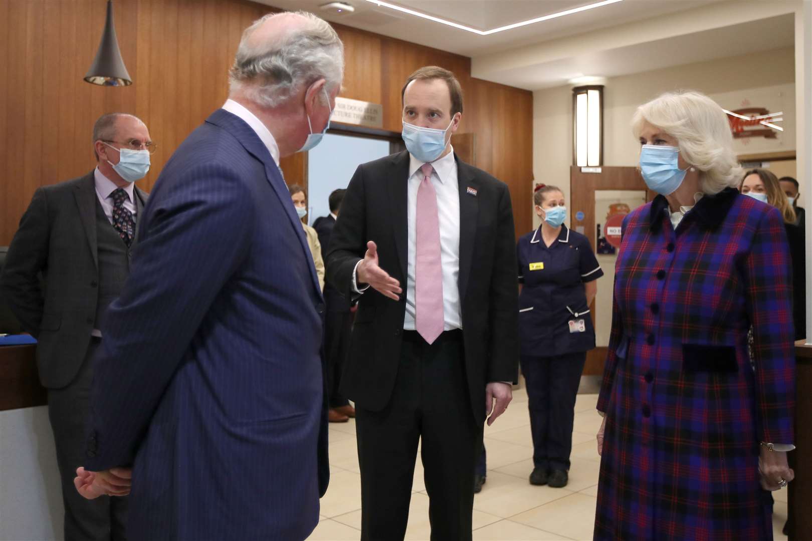 The royal couple talk to Health Secretary Matt Hancock (Molly Darlington/PA)