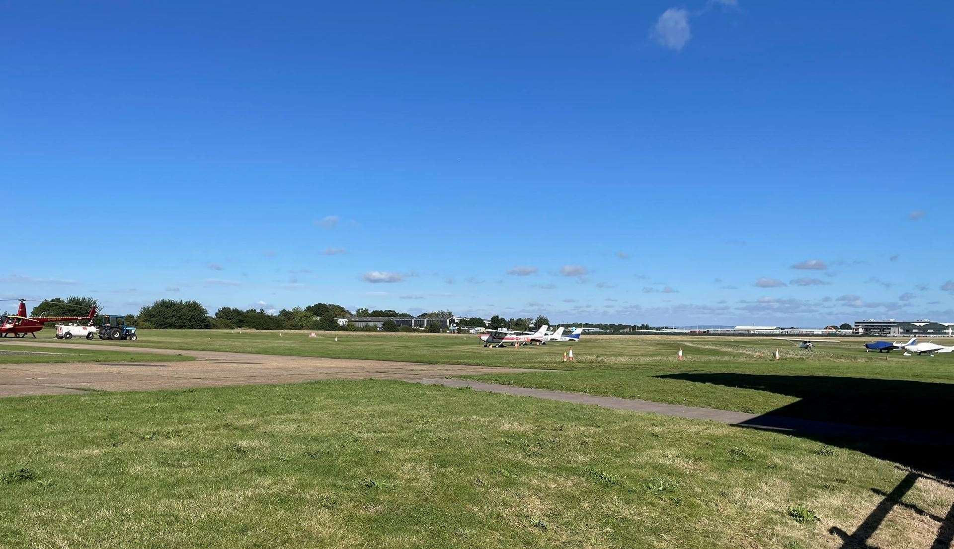 The Rochester Airport airstrip hummed with the sound of aeroplane engines