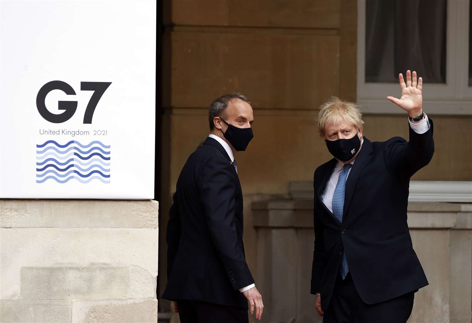 Dominic Raab and Boris Johnson at Lancaster House in London (Adrian Dennis/PA)