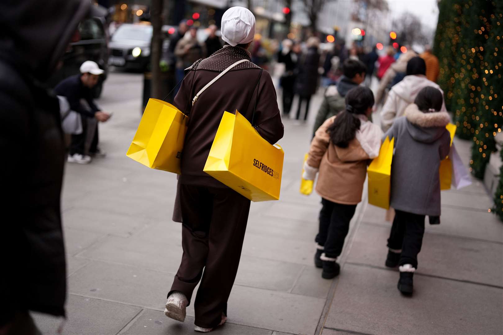 Shoppers on Oxford Street, London, during the Boxing Day sales (Jordan Pettitt/PA)