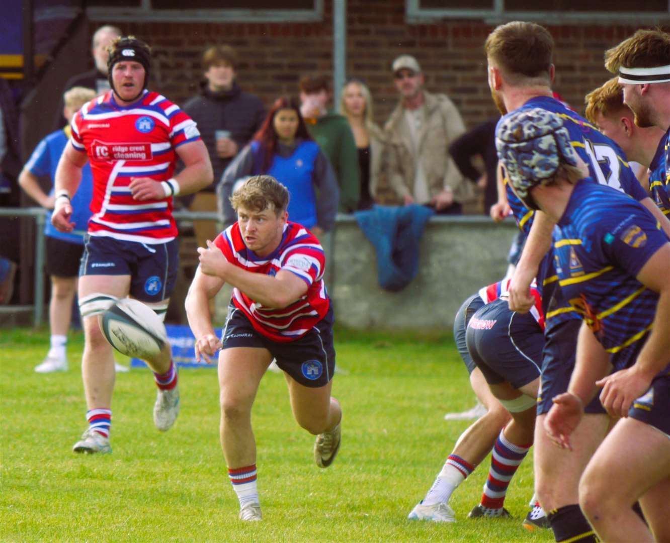 Tonbridge Juddians' Connor Lloyd looks for a teammate at Worthing. Picture: Adam Hookway