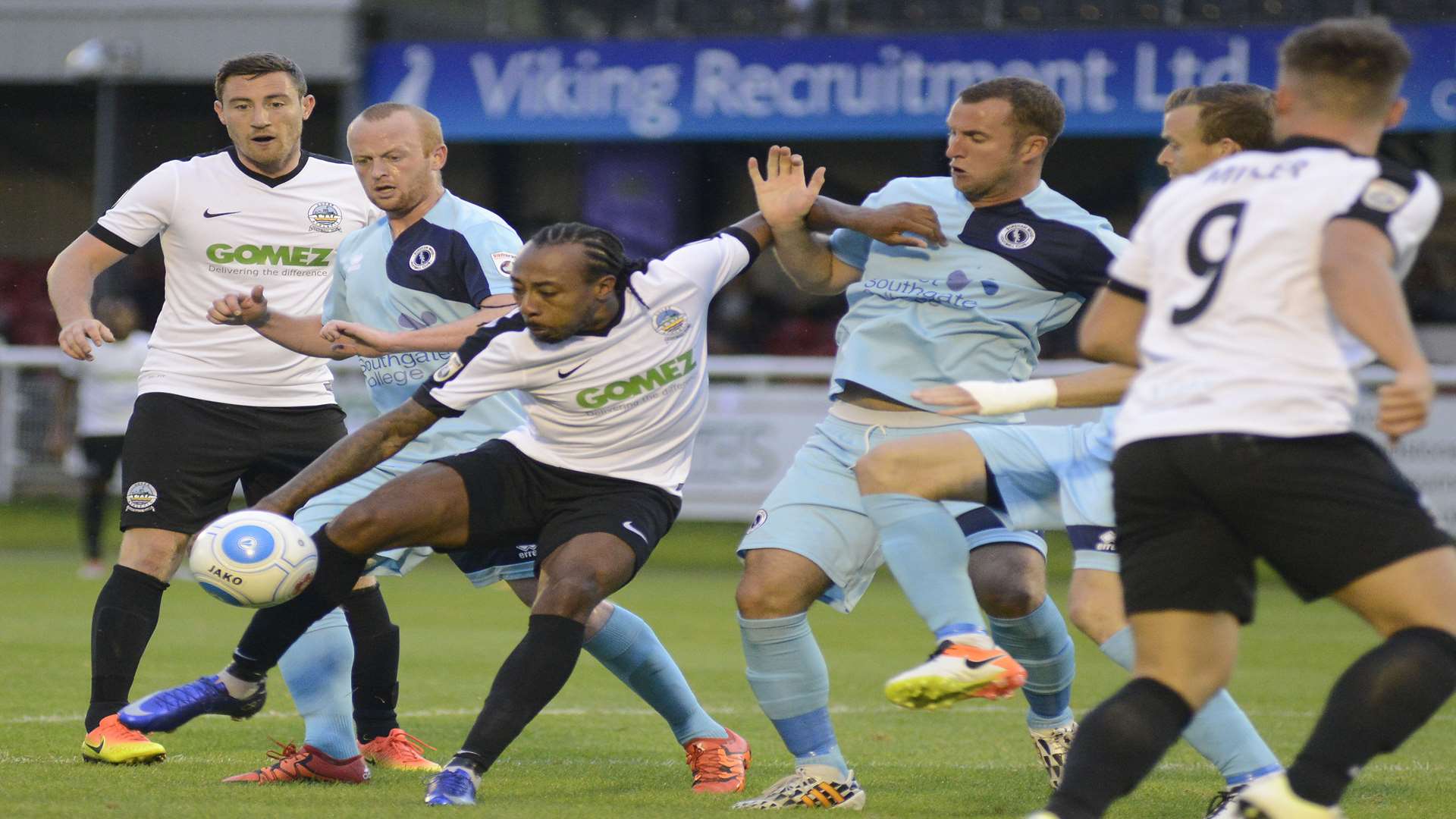 Dover's Ricky Modeste turns in the box to get his shot away. Picture: Paul Amos