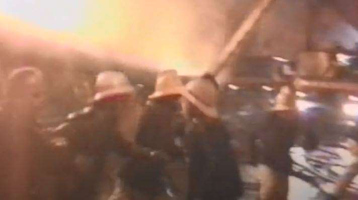 Firefighters flee the collapsing building in Canterbury. Picture: YouTube