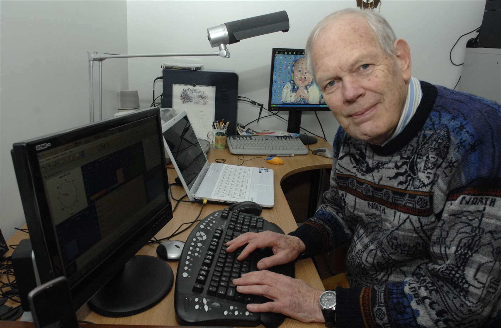 Jeremy Procter analysing the data from his weather monitoring station. Picture: Chris Davey